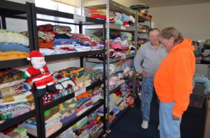 Quilter Kellogg Patton, foreground, drops of quilts to Prescott's Blankets 4 Kids program