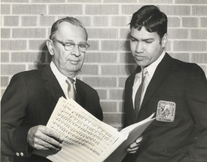 Randy Carrillo, right, goes over music with Los Changuitos Feos music director Art Pepin in the late 1960s.